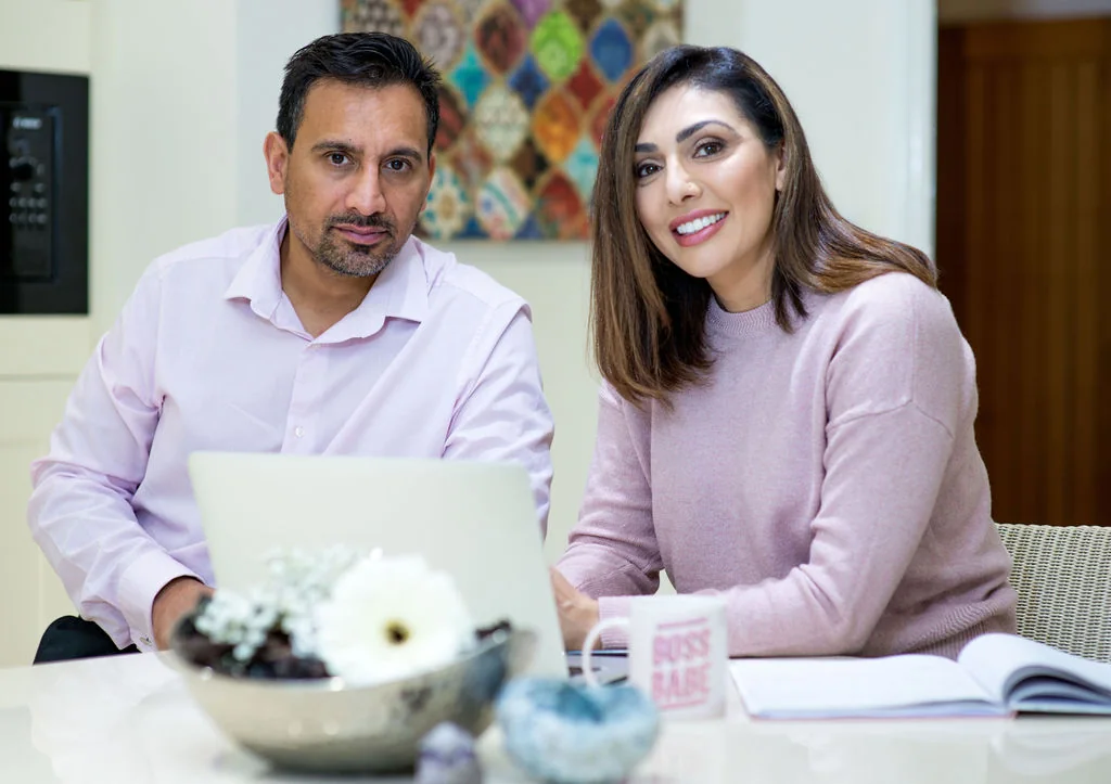 Surinder Ahitan and Manroop Ahitan, founders of ResoClinx — clinic operators behind the system, photographed at their working desk.