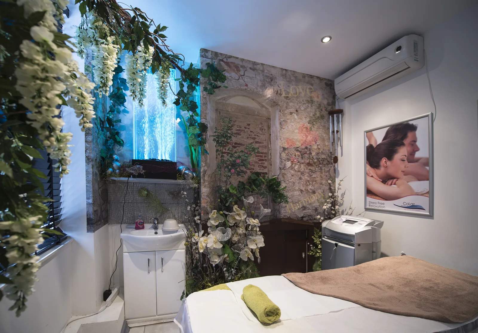 A second themed treatment room in another clinic, with mood lighting and a feature wall